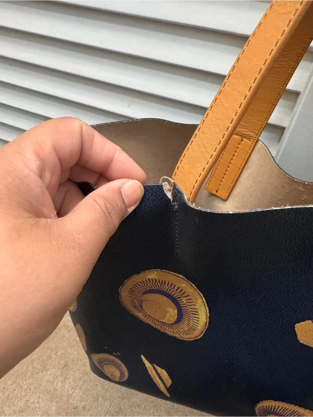 Tory Burch Black Leather Tote with Yellow Hat Motif
